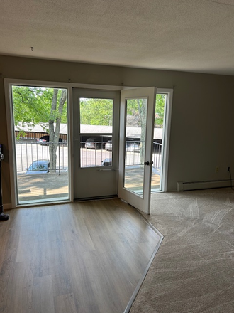 dining area is to the left, living room to the right - Manor Woods Condominium