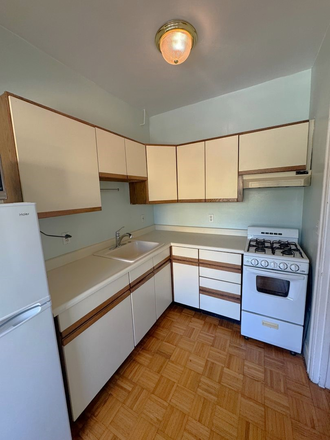 Kitchen - Traditional unpretentious building features a completely refreshed Studio Apartments