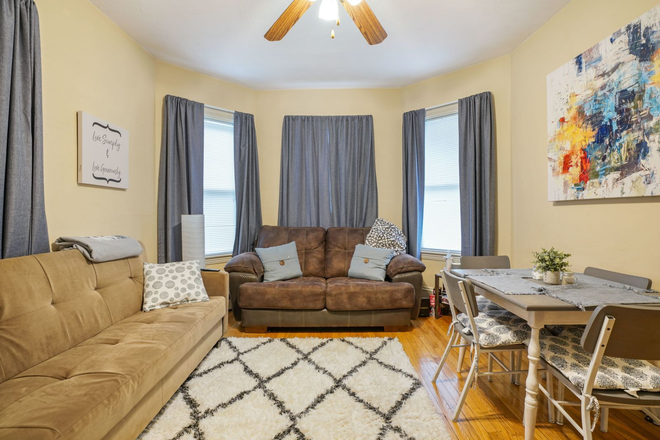 living room - Bright and Sunny 3 Bed / 1 Bath w/ LAUNDRY IN UNIT!! Avail. 9/1/25!! Apartments