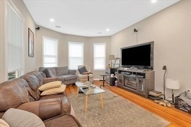 Living Room - 3 Bed 2 Bath in Mission Hill! Laundry in unit!!