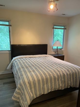 Bright bedroom with windows and natural light - 2BR/2BA Mill Creek condo, walking distance to campus