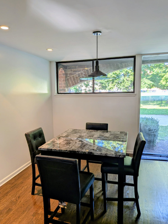 Dinning room area - Stunningly Renovated 3-Bed Townhome in the Heart of Little Italy Steps from UIC, Taylor St. & More!