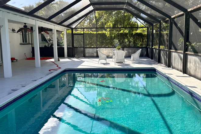 pool - furnished room with private bathroom