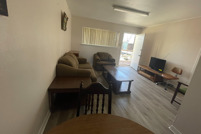 02- Living room and front door - 1 and 2 BR/1-Bath furnished apt 2.8 miles from Rice; Bills paid except electricity.