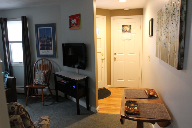 entryway, tenants as asked to remove shoes when entering the carpeted area - 10 Chaucer Dr., North Kingstown, RI 02852  Private entrance, fully furnished, all utilities included Apartments