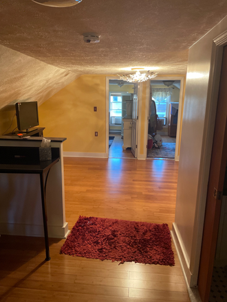 Living Room to two Bedrooms - Julianna Hines Apartments