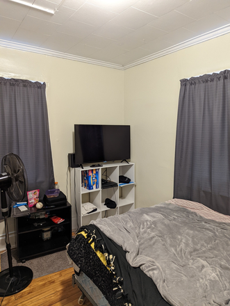 Bedroom - Cozy 2 Bedroom Right Across the Street from Campus! Apartments