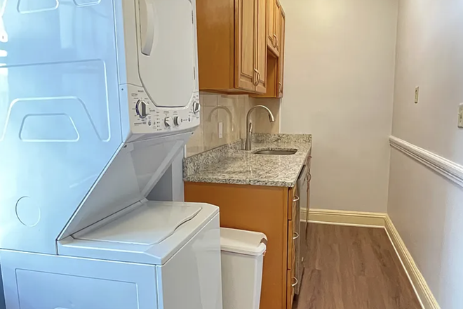 Other side of kitchen - 153 Strathmore Unit 6, close to campus with balcony, private/in-unit laundry, and AC + heating Apartments