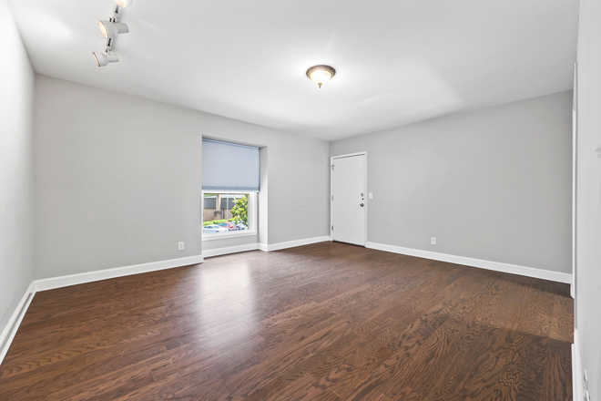 Living Room and Front Door (From Hall) - **REDUCED** Walk to Emory, CDC, & Lullwater – 2 BR / 2 BA Condo