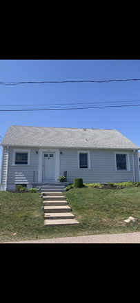 Front of cape style house - 15 Dudley Drive Narragansett, RI 02882