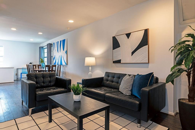 Living room - Beautiful 3 bed/3 bath apartment available August 18, 2026