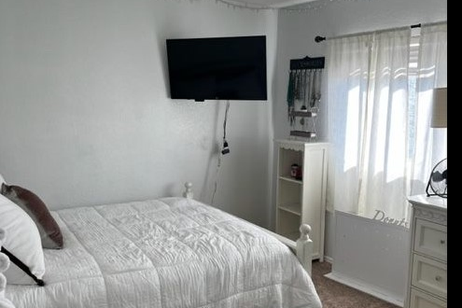 View from entrance of bedroom door, comes with Smart TV - Private 2 (ea) bedrooms w/private full bthrm, 1 bdrm furnished w/queen bed, other bdrm non-furnishe House