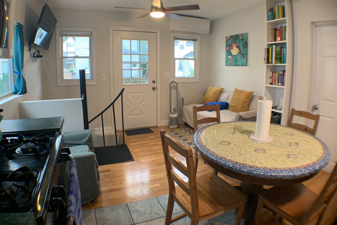 1st floor common area - Furnished 3BR/1BA in Allston — walk to Harvard & BU, in-unit laundry, backyard Duplex
