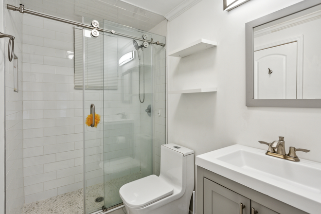 bathroom with shower - Garage Cottage-Studio Apartments