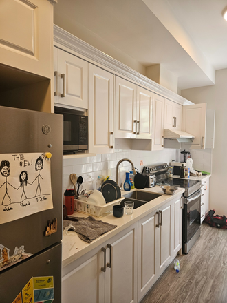 Kitchen - 5 minute walk to campus. Very close to St. George and College. Bedroom with private bathroom. $1350