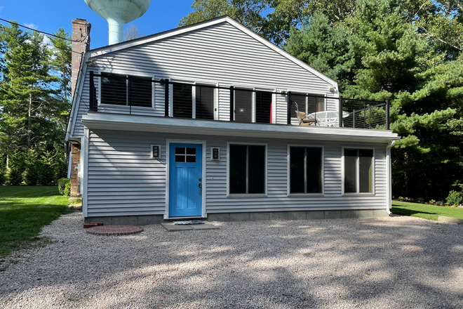 New front room, front door, and composite deck with cable railings - 44 Mautucket Road South Kingstown, RI 02879 House