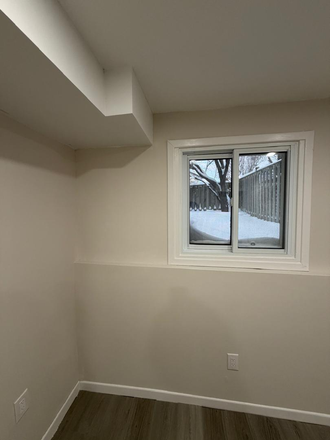bedroom - Renovated 1-Bedroom Lower Level Apartment Near Square One and Transit