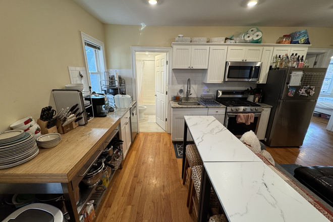 Call call or text Arezou at 617-584-7817 - Floor thru 4 bed 2 bath unit in Porter Square! W/D in the unit!LL paying 1/2 broker fee! Apartments