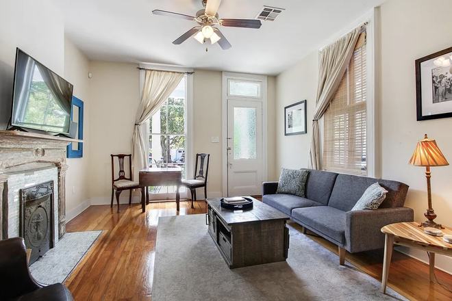 Living room - Furnished 1BR in prime Uptown neighborhood Apartments