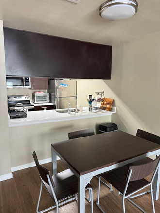 The dining area of my actual apartment - Royal Village Apartments! Great location and apartment! Amazing roommates!!! 4x2 girls only:)