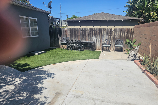 Back Yard - This 3 bed 1 bath HOUSE, will be ready for 08/08/2026 move-in