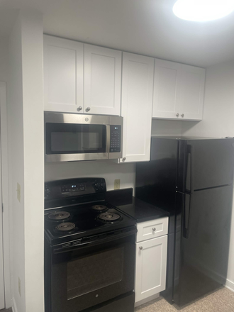 Kitchen left side - Apartment just off campus (undergrads only, availability starting Dec '26)