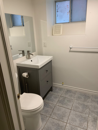 bathroom - Updated, bright  1 bedroom basement apartment in stately Annex family home, incl utilities/laundry