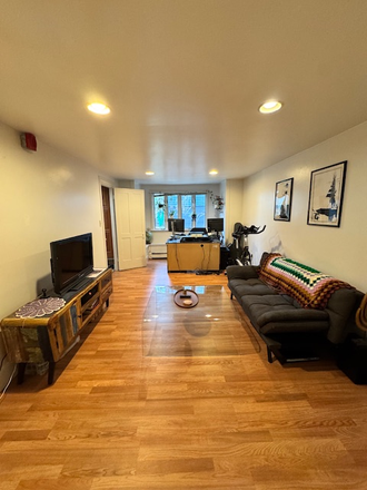 living room - One bed apartment Garden Level Heat & Hot water included walk to Campus