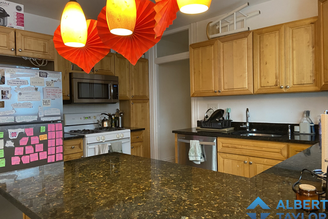 Kitchen - Cozy 4-bedroom with Laundry in-unit!! Apartments