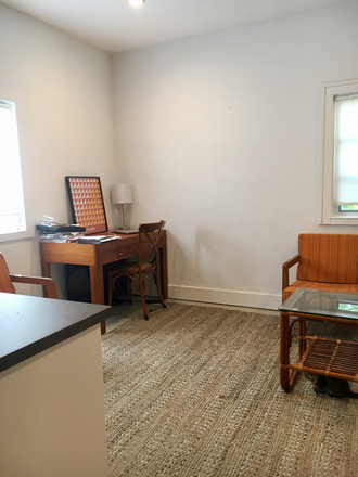 Living area - quaint cottage located in a quiet residential area of beautiful Coral Gables. Apartments