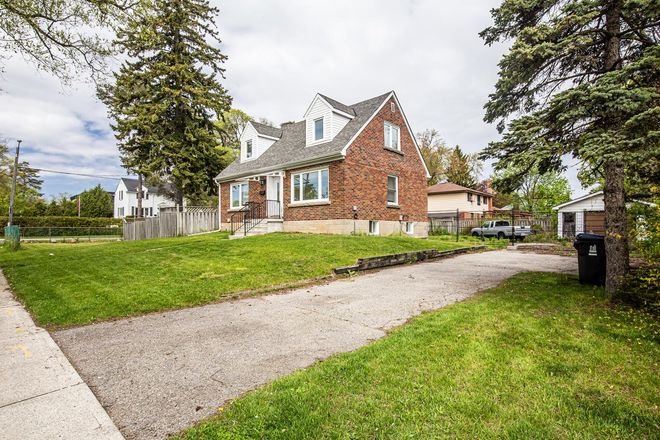 View from Lawrence ave. Side of the house , showing parking - 4-Bed. + 2-Bed.house .Close to U of T Scarborough .Separate Ent. Steps to amenities, TTC, library!