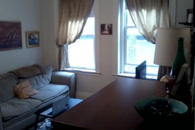 Hub Realty - Large front one bedroom split, with renovated kitchen, in Allston Apartments