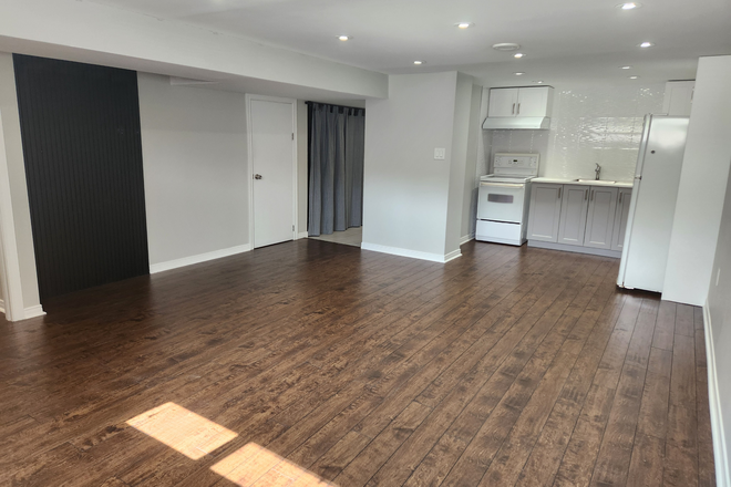 living/sleep area looking towards kitchen - private  bachelor   basement apartment