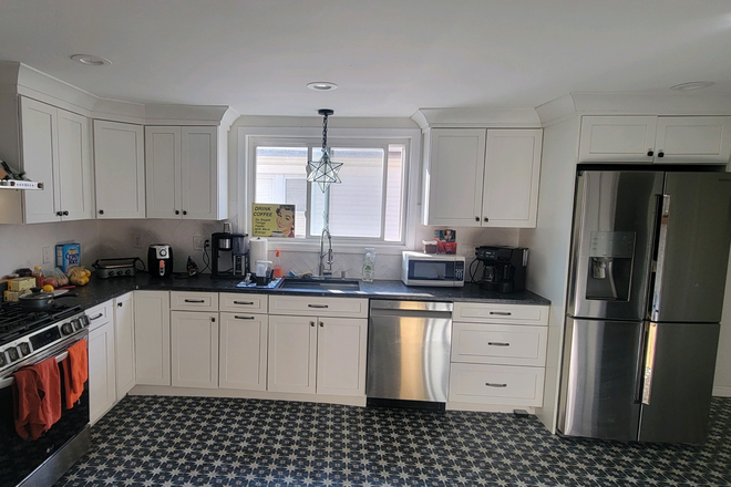 Large Kitchen, ample storage - Bright spacious home: Roommates Wanted