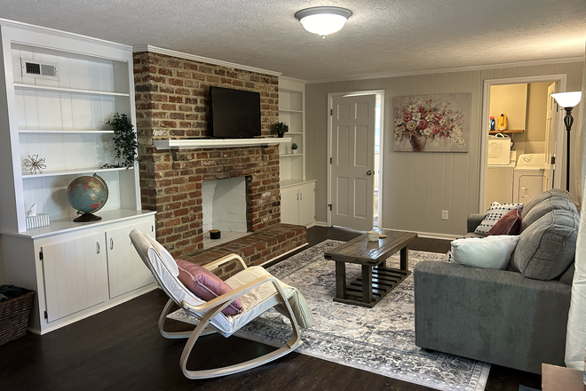 Laundry Room and Bathroom located off of the living room - EVERYTHING INCLUDED Furnished Terrace Level/Walkout Basement Apartment