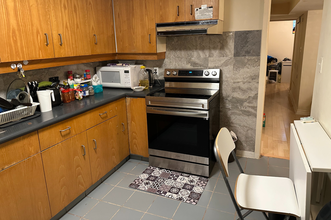 Kitchen - Furnished one bedroom one den unit, steps to UofT campus, private bath, all utilities, internet incl