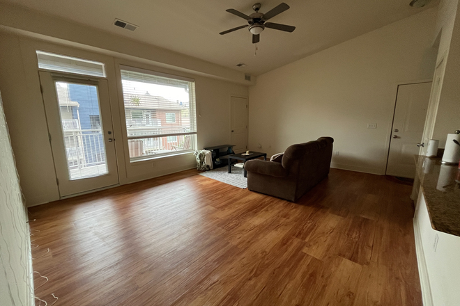 Living room - SUMMER 2026 SUBLEASE, 2 bedrooms available in 2BR apartment at Euclid Square, close to campus