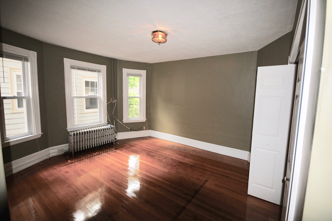 Living Room - Spacious and updated 4-bed, 2-bath - Available 9/1/25! Apartments