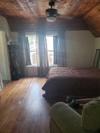 Living area, ample undereave storage, closet. - Museum District Garage Apartment--great location