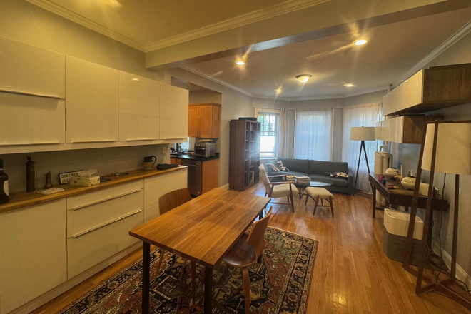 Living Room - Modern Heated Central Square 1 bed with In Unit Laundry Apartments