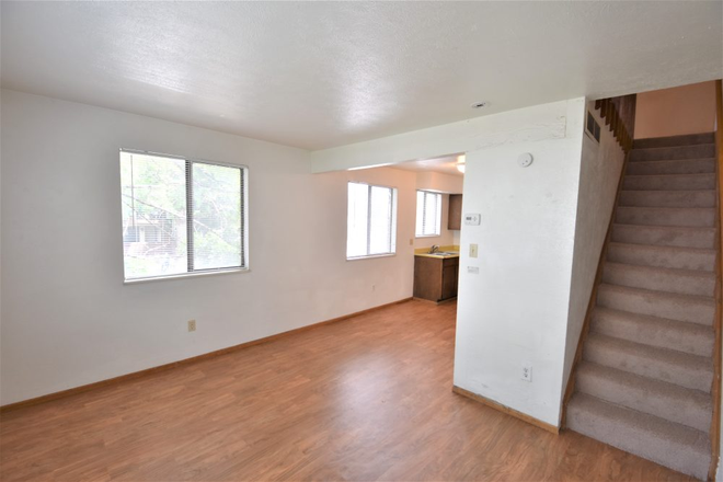 Living Room - Amazing location, 2-story unit, Laundry facility on site Apartments