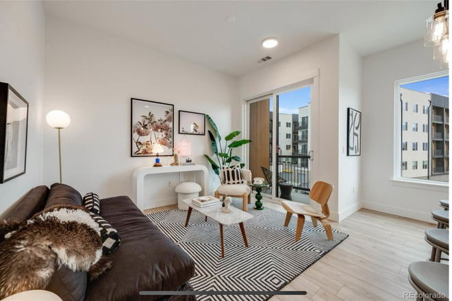living area - Beautiful New 2 Bed/2 Bath Condo Overlooking Regis and Front Range (EV Charger)