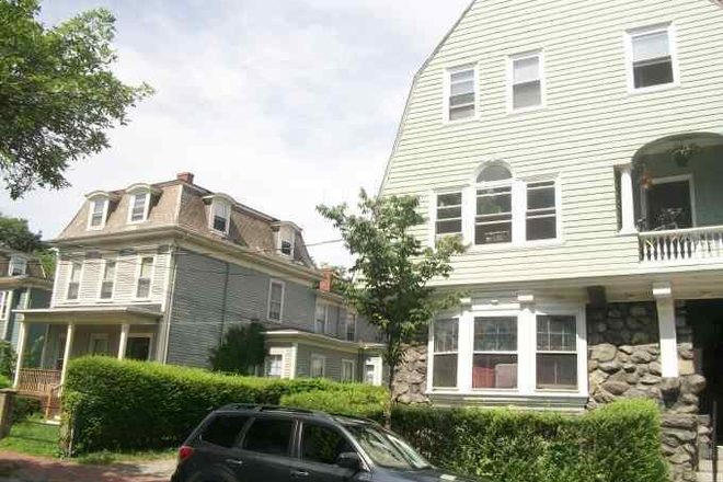 front - harvard area! small building, charming, porch, laundry