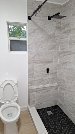 Bathroom- tiled shower area - Hourglass District 1/1 Available now Triplex
