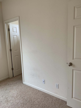 right hand wall with closet door - Merced five bedroom home, one bedroom free (one single, shared bathroom)