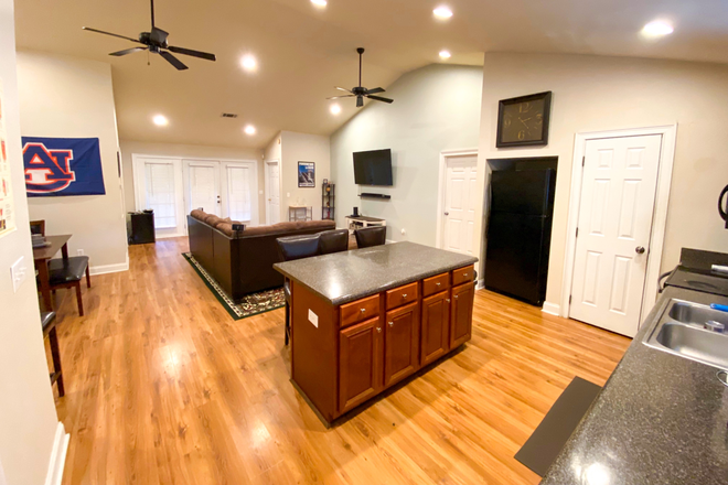 Living space - Eagles Landing South - Private bath and furnished living area including big screen TV! House