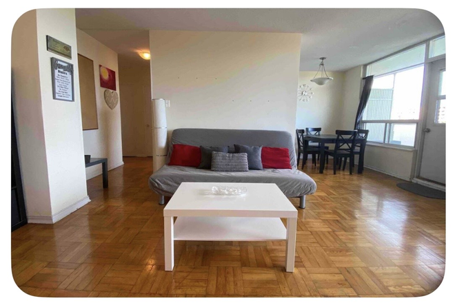 Living room - 1 Bedroom Furnished Apartment, internet and utilities included