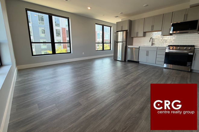 living room/dining/kitchen - *NO BROKERS FEE!* Stunning 2 Bed/2Bath LAUNDRY IN UNIT! ROOF DECK! Apartments