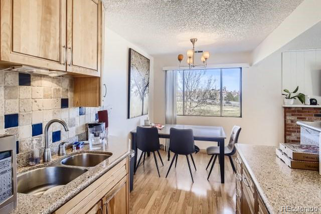 Bright dining space with mountain views - Updated 2BD/2BA Corner Condo w/Views. Across the street from CU & close to Chautauqua