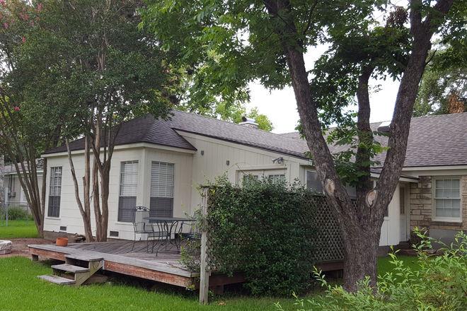 Back deck (off commons area) - Available Aug 18 2025.  3 bdm, 2 bath on large lot. 3 blks from TAMU.  $1,650 mo + utilities. House